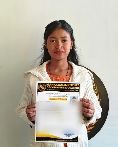 Student with a course completion certificate at Mahakaal Institute